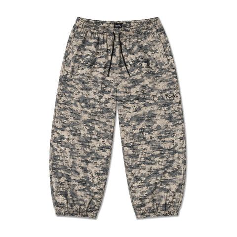Howl Nowhere Pant in Camo – flat lay