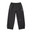 Howl Shell Pant in Black – flat lay